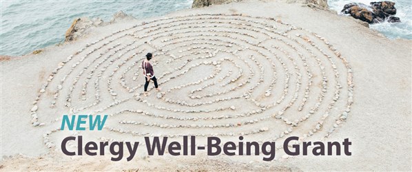 Person walking Labyrinth on beach