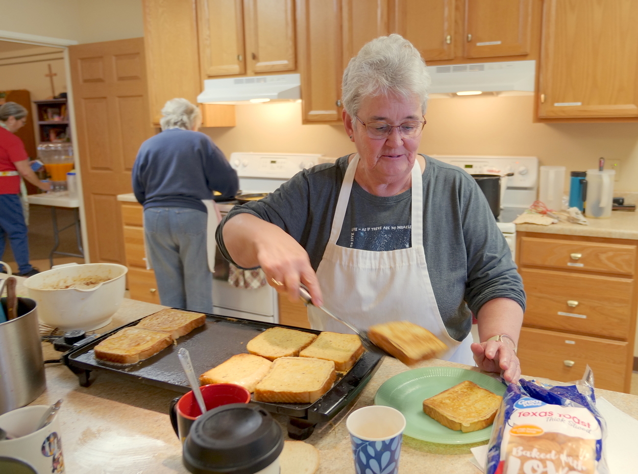 Ruth Pourier making french toast
