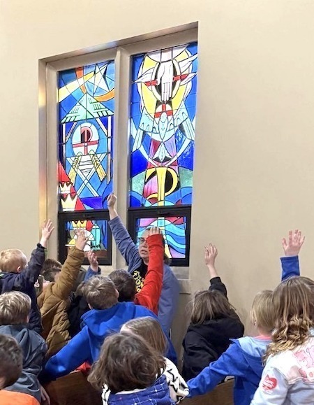 Kids and stained glass window
