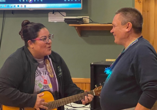 two people with guitar