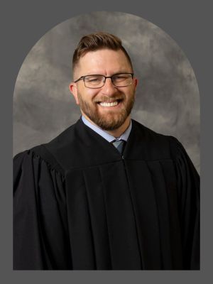 Pastor in black robe
