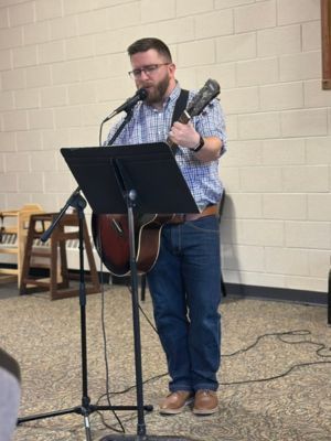 pastor playing guitar