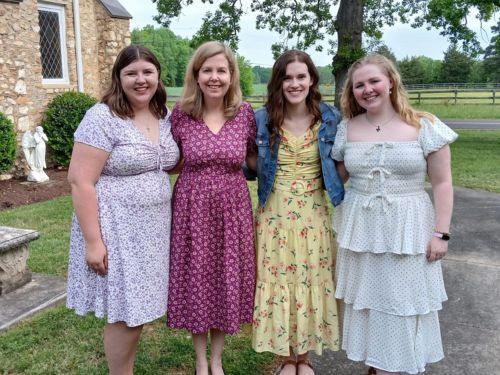 Four women standing