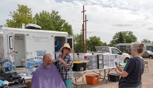 Woman photographs haircut