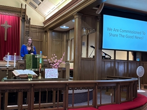 Woman Preaching at church pulpit