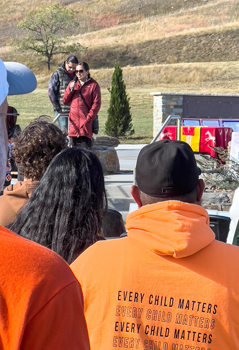 Woman speaking to crowd
