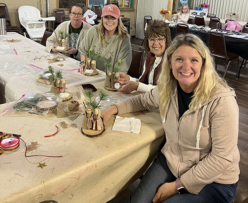 Women at table with crafts