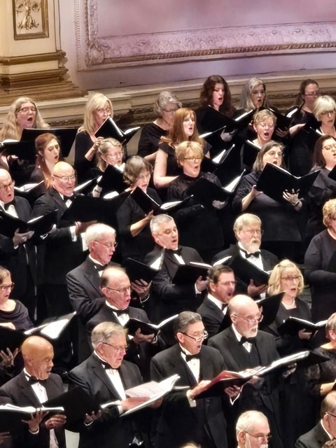 Singers in large choir