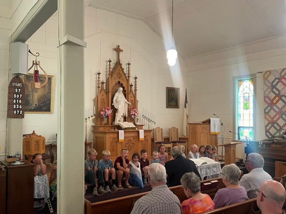 Children on church chancel