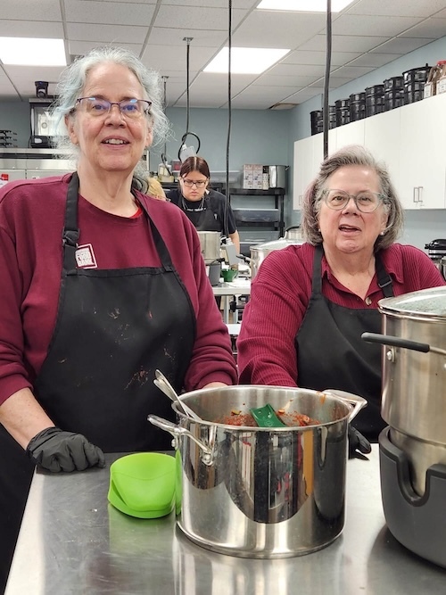 Two women in commercial kitchen