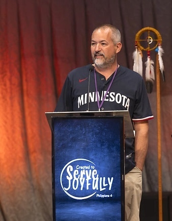 pastor at podium