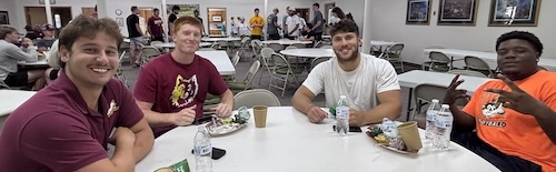 football players at table