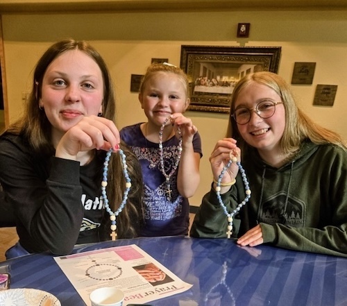 Three Girls With Beads